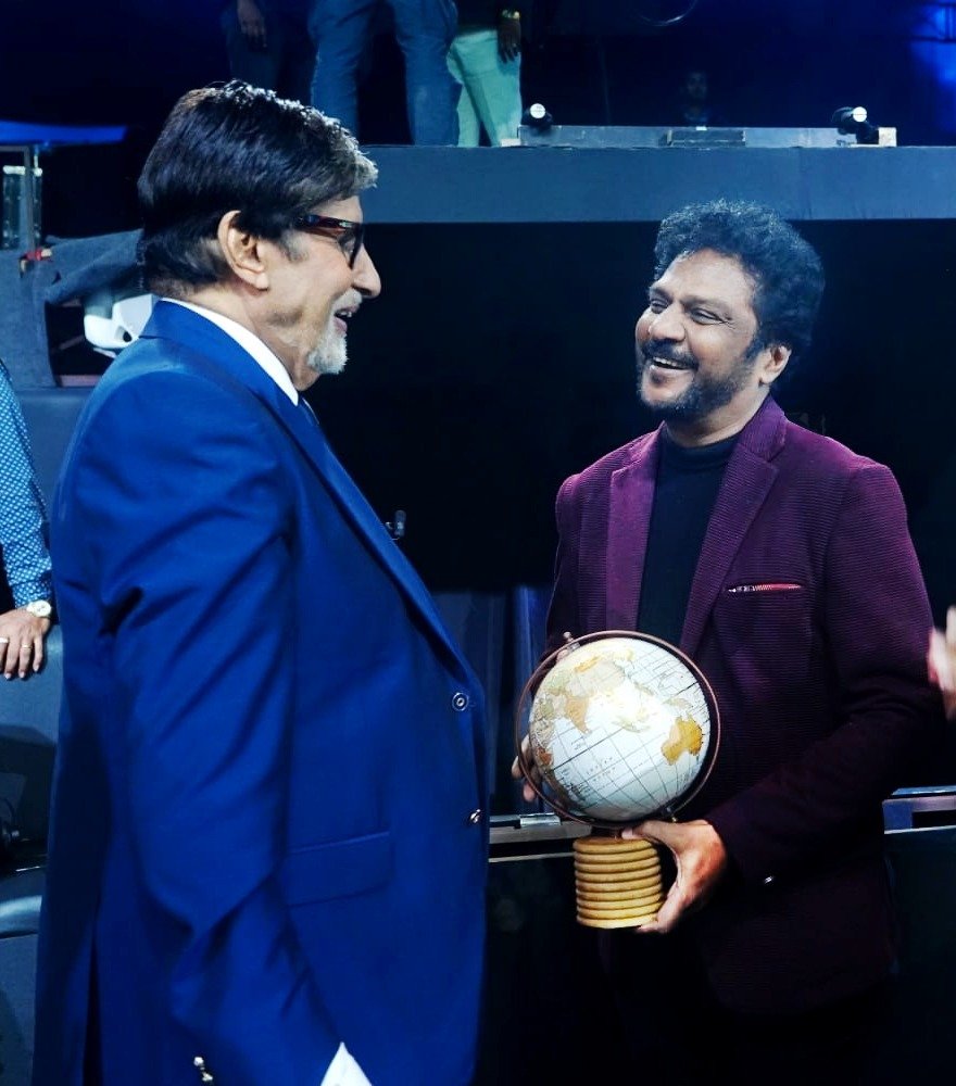 Lion Dr Y Kiron with Amitabh Bachchan at a distinguished event